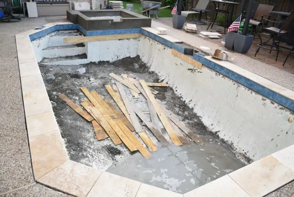 what not to fix when selling a house: Empty old pool
